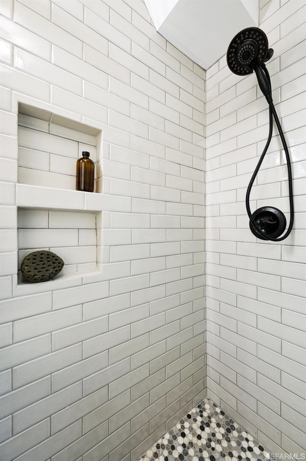 41 Montezuma Street San Francisco, CA 94110 - Photo 34 of 62 a bathroom with a shower