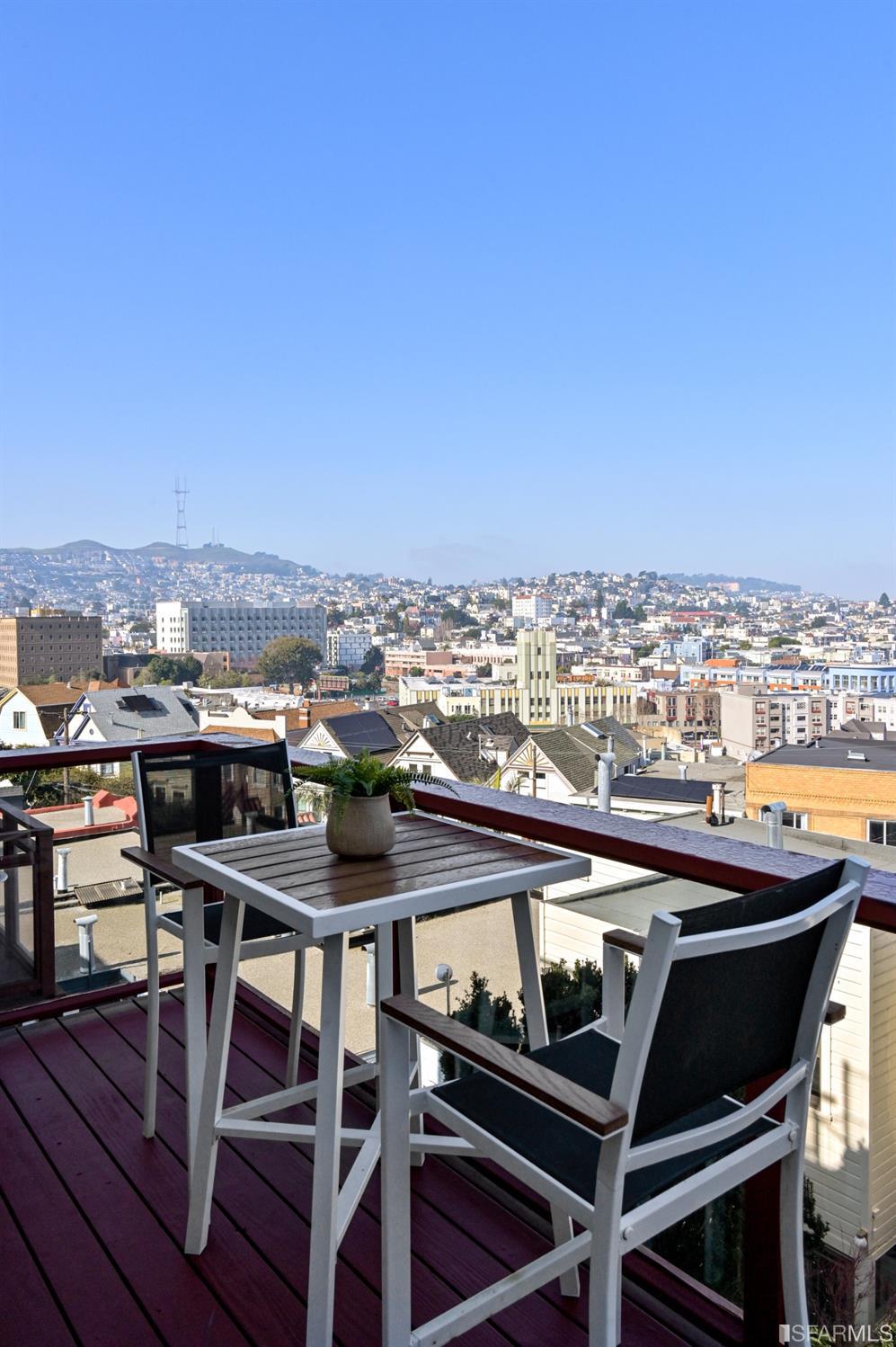 41 Montezuma Street San Francisco, CA 94110 - Photo 54 of 62 a view of a chairs and table in a balcony
