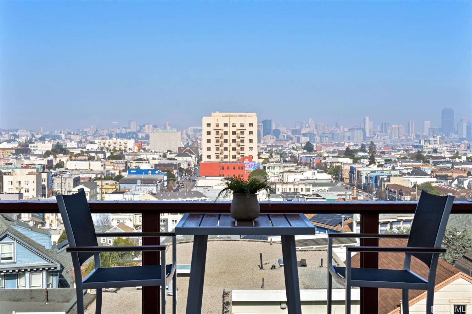 41 Montezuma Street San Francisco, CA 94110 - Photo 55 of 62 a view of a chairs and table in a terrace