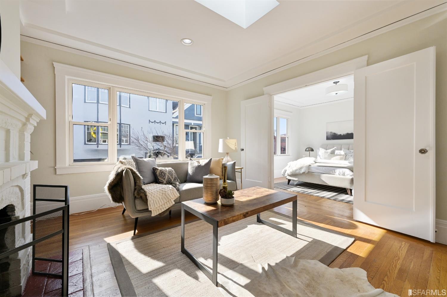 41 Montezuma Street San Francisco, CA 94110 - Photo 6 of 62 a living room with furniture and a large window