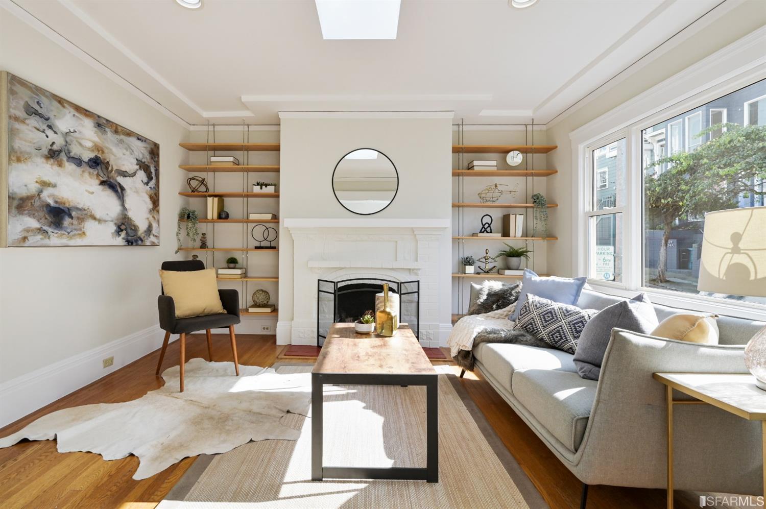 41 Montezuma Street San Francisco, CA 94110 - Photo 8 of 62 a living room with furniture and a fireplace