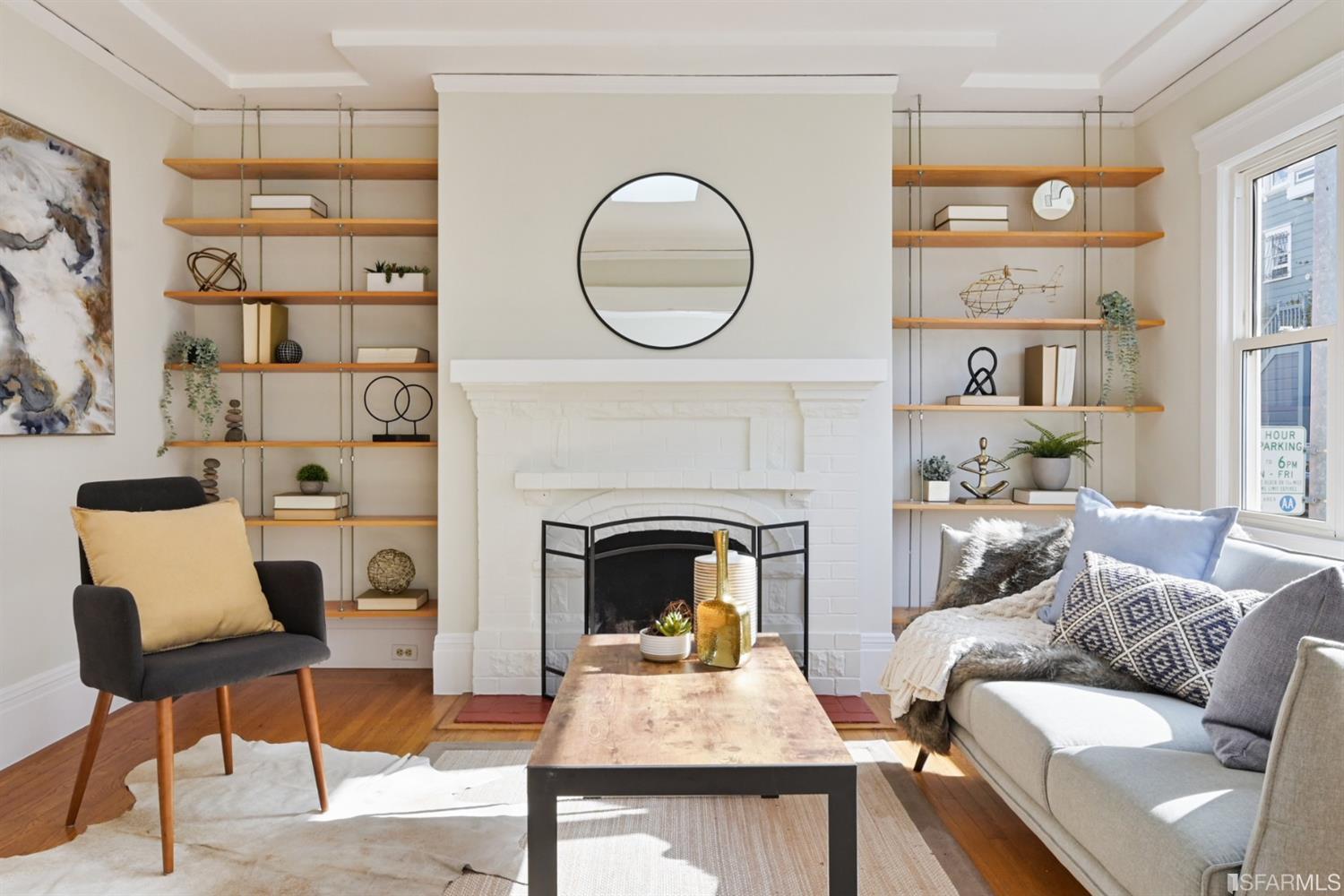 41 Montezuma Street San Francisco, CA 94110 - Photo 9 of 62 a living room with furniture and a fireplace