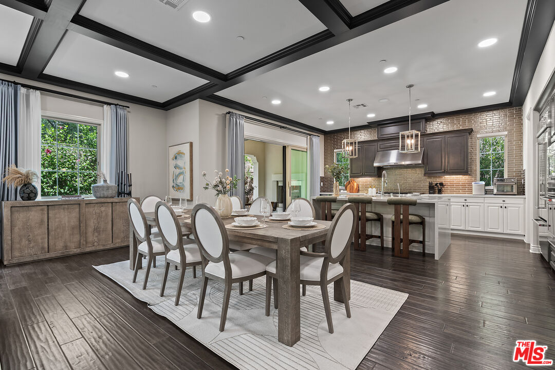 55 Suede Irvine, CA 92602 - Photo 14 of 59 a view of a dining room with furniture window and wooden floor