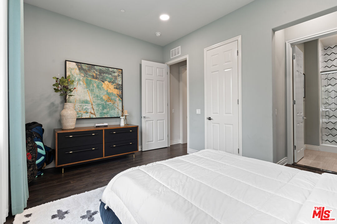 55 Suede Irvine, CA 92602 - Photo 20 of 59 a bedroom with a bed and a dresser