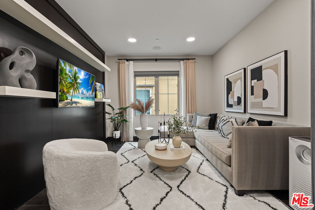 55 Suede Irvine, CA 92602 - Photo 25 of 59 a living room with furniture and a large window