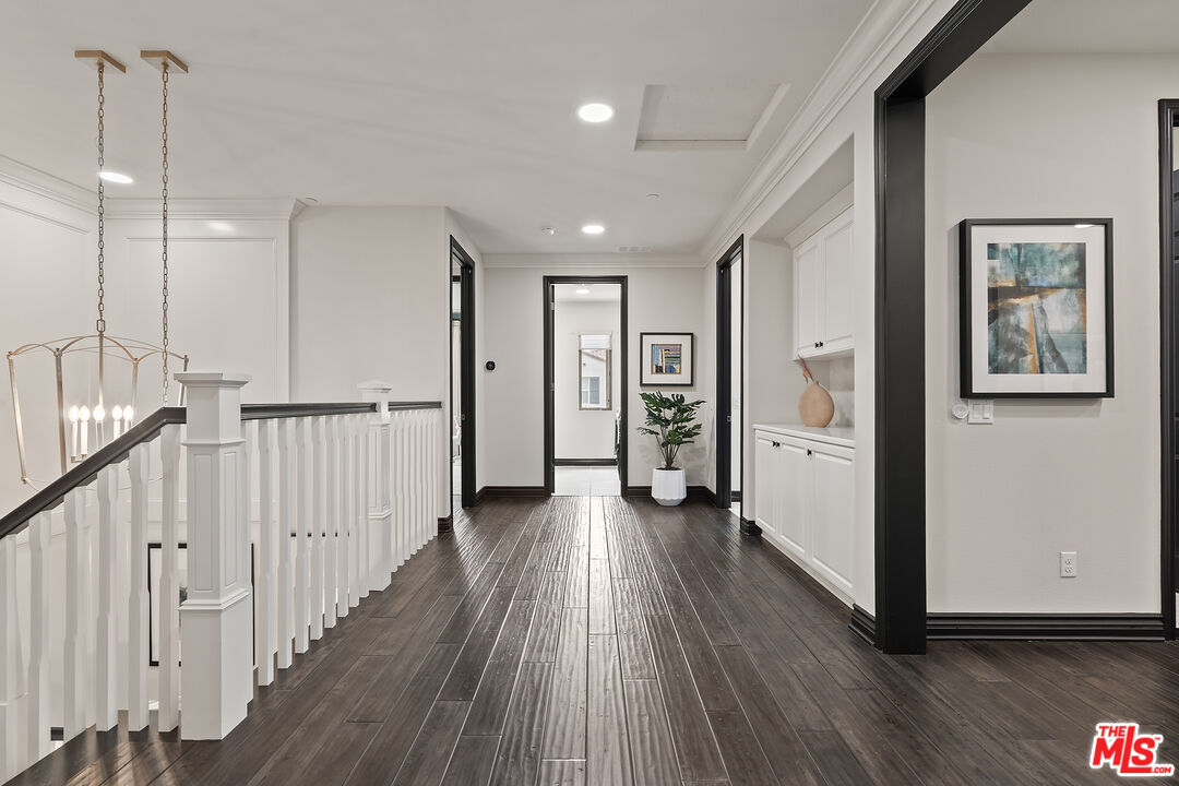 55 Suede Irvine, CA 92602 - Photo 30 of 59 a view of hallway with wooden floor