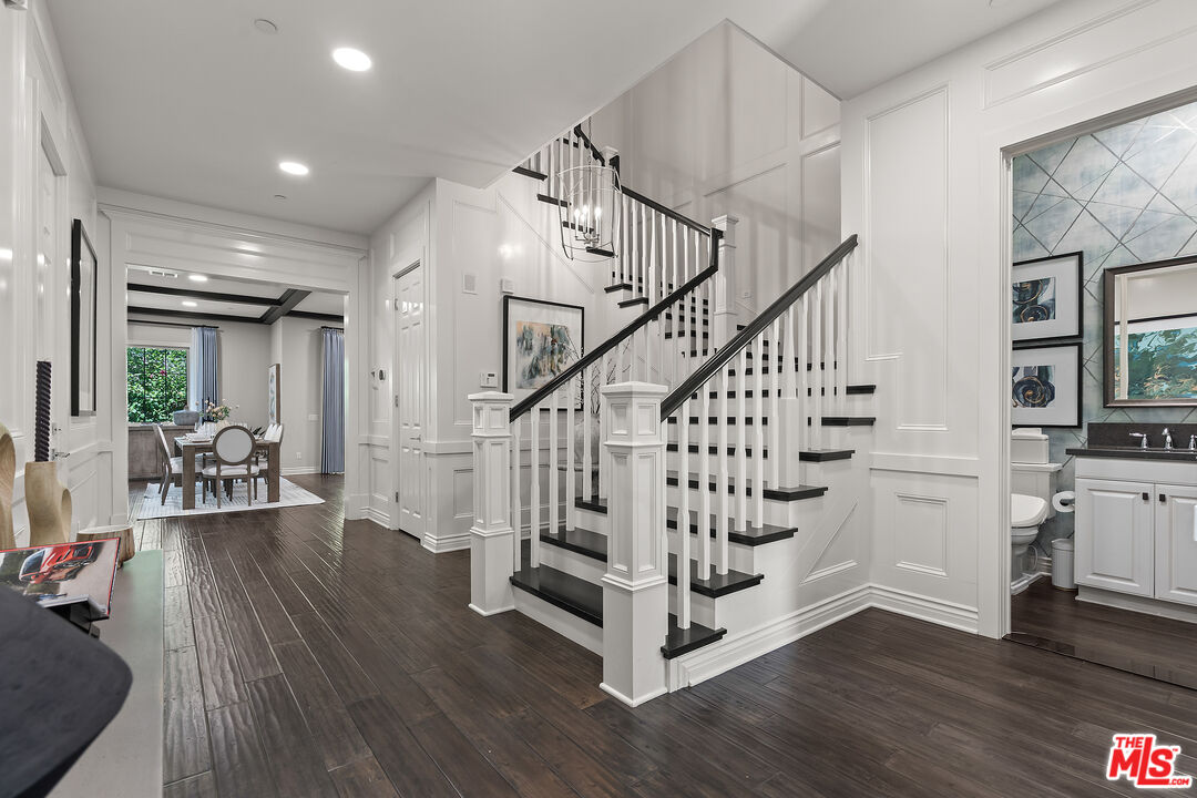 55 Suede Irvine, CA 92602 - Photo 3 of 59 a view of entryway and hall with wooden floor