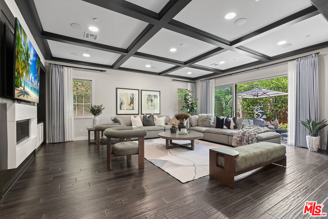 55 Suede Irvine, CA 92602 - Photo 5 of 59 a living room with fireplace furniture and a flat screen tv