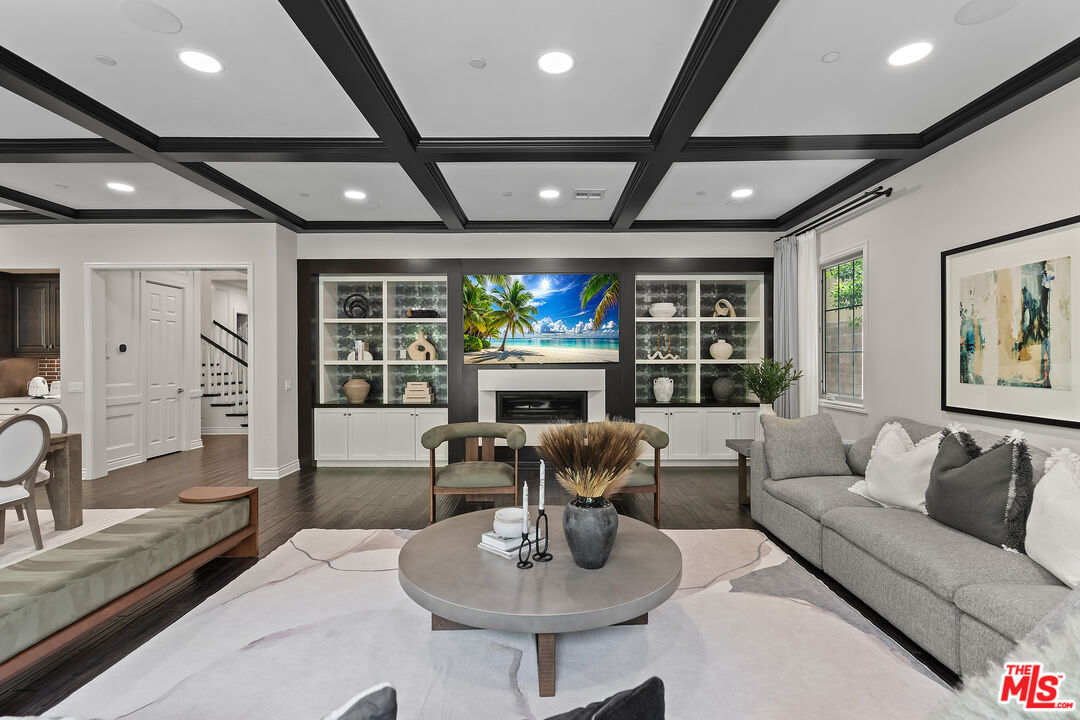 55 Suede Irvine, CA 92602 - Photo 8 of 59 a living room with furniture a fireplace and a large window