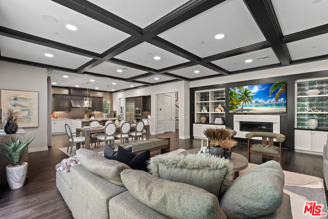 55 Suede Irvine, CA 92602 - Photo 9 of 59 a living room with furniture fireplace and a large window