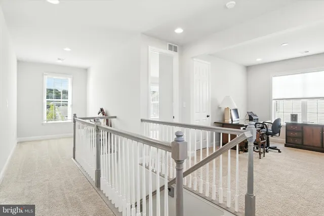 a view of entryway and workspace