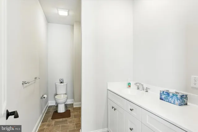 a bathroom with a sink and a toilet