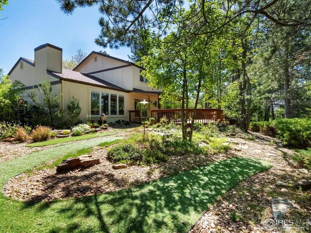 a view of a backyard with a garden