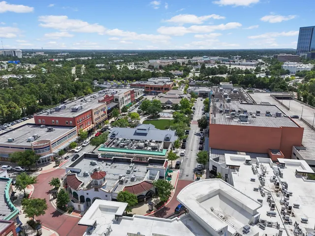 an aerial view of a city with lots of residential buildings