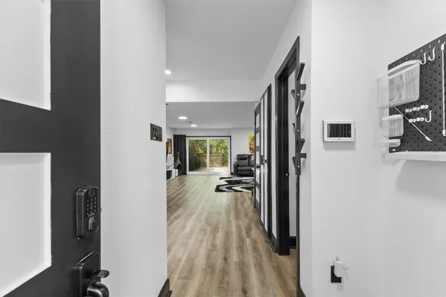 a view of a livingroom with furniture and windows