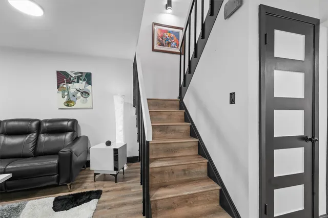 a view of livingroom with furniture and workspace