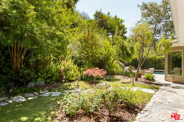 a view of a bench in the garden