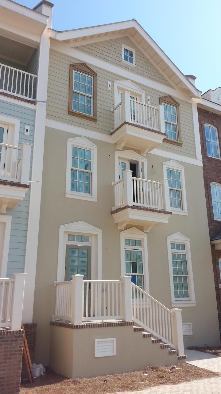 3 Prominence Inlet Beach, Unit 3 Inlet Beach, FL 32461 - Photo 1 of 4 a front view of a house with many windows