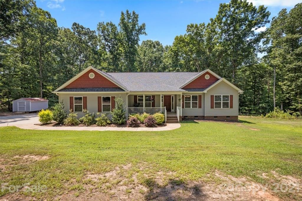 769 Shady Forest Road Clover, SC 29710 - Photo 1 of 36 a front view of a house with yard and green space