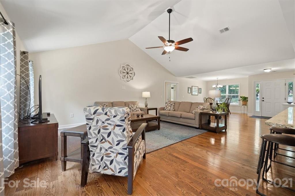 769 Shady Forest Road Clover, SC 29710 - Photo 13 of 36 a living room with furniture and wooden floor