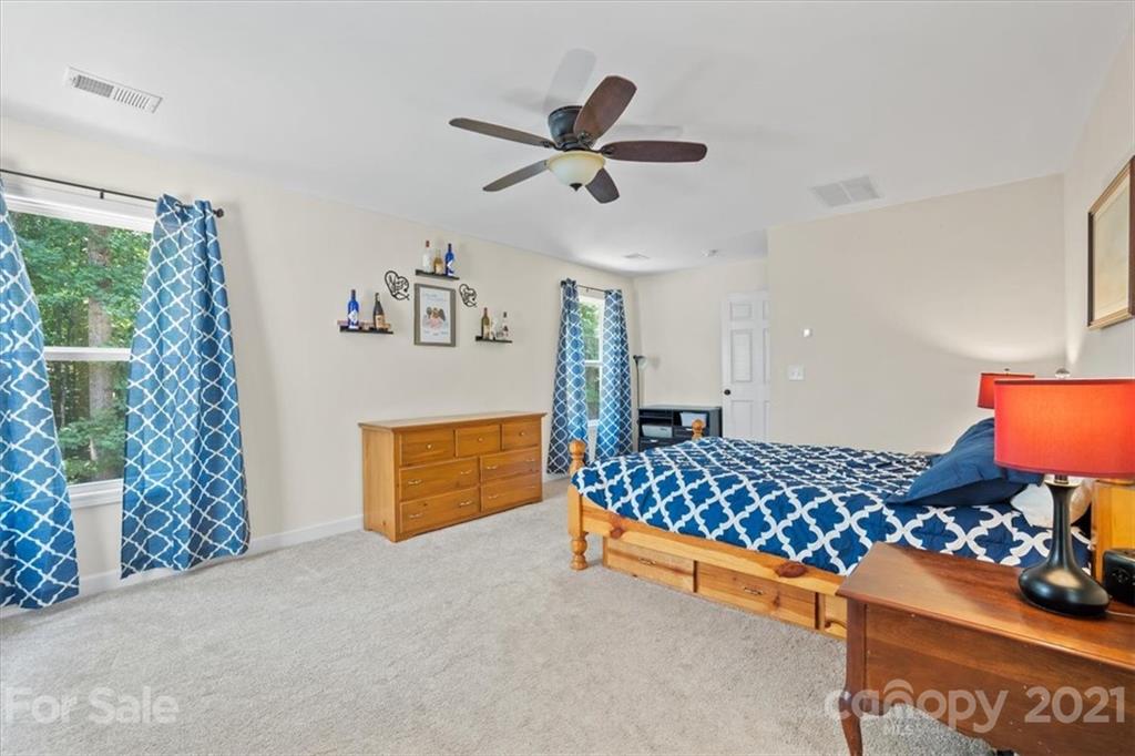 769 Shady Forest Road Clover, SC 29710 - Photo 25 of 36 a bed room with a bed and a window