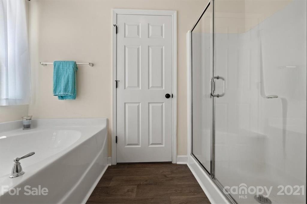 769 Shady Forest Road Clover, SC 29710 - Photo 28 of 36 a bathroom with a bathtub and a sink