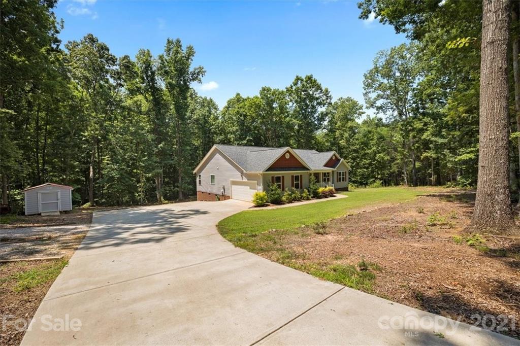 769 Shady Forest Road Clover, SC 29710 - Photo 30 of 36 a view of a house with a yard