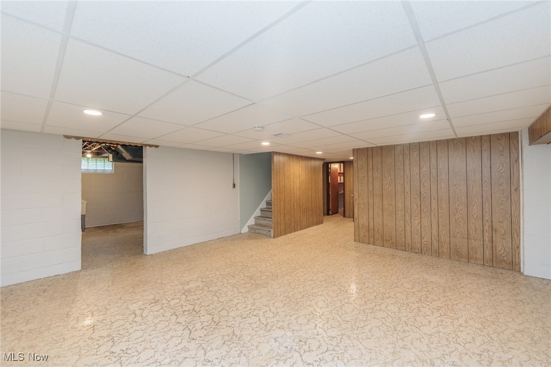 952 Murray Road South Euclid, OH 44121 - Photo 20 of 30 Basement with wooden walls and a drop ceiling