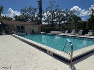 16805 Davis Road, Unit 123 Fort Myers, FL 33908 - Photo 15 of 16 a view of a backyard with sitting area