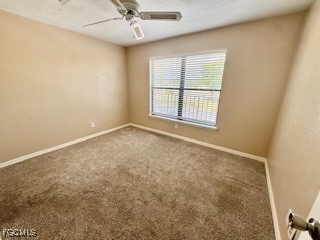 16805 Davis Road, Unit 123 Fort Myers, FL 33908 - Photo 10 of 16 an empty room with a window