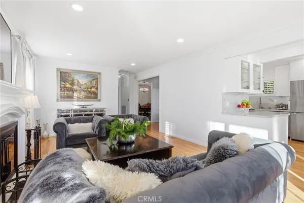 a bedroom with furniture and a fireplace