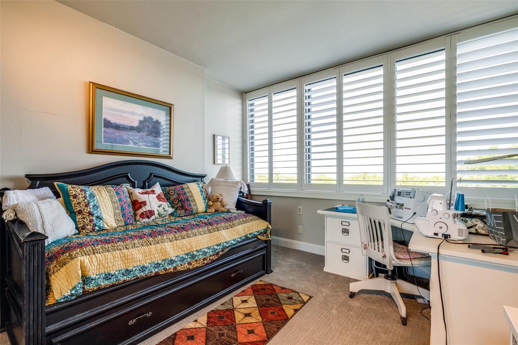 5200 Keller Springs Road, Unit 535 Dallas, TX 75248 - Photo 15 of 25 a bedroom with a bed and a window