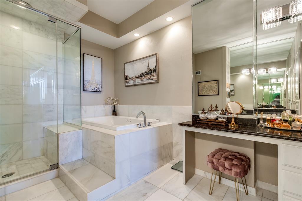 5200 Keller Springs Road, Unit 535 Dallas, TX 75248 - Photo 16 of 25 a view of a bathroom sink and a mirror