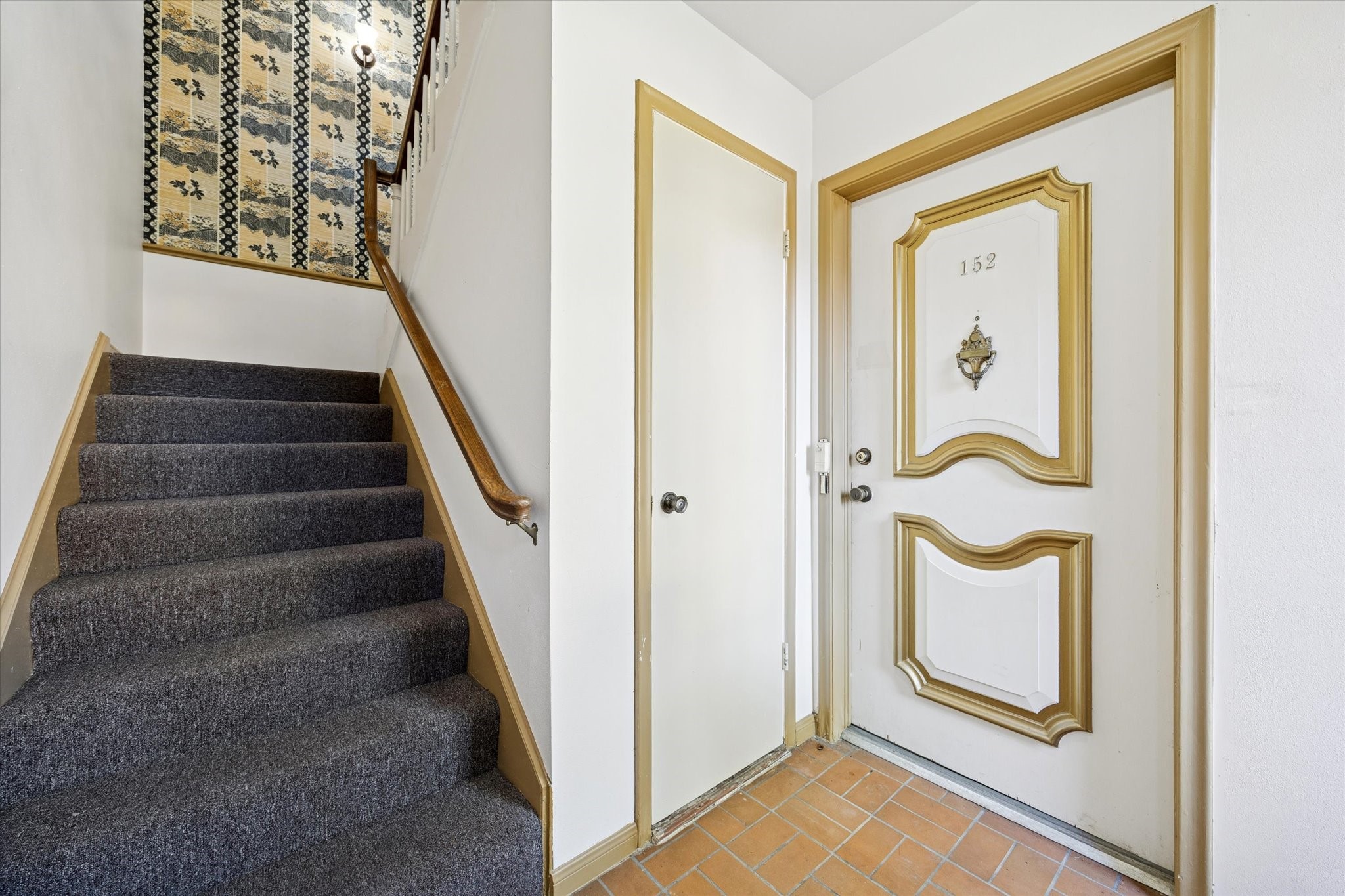 7600 Burgoyne Road, Unit 152 Houston, TX 77063 - Photo 13 of 16 a view of a door with wooden floor