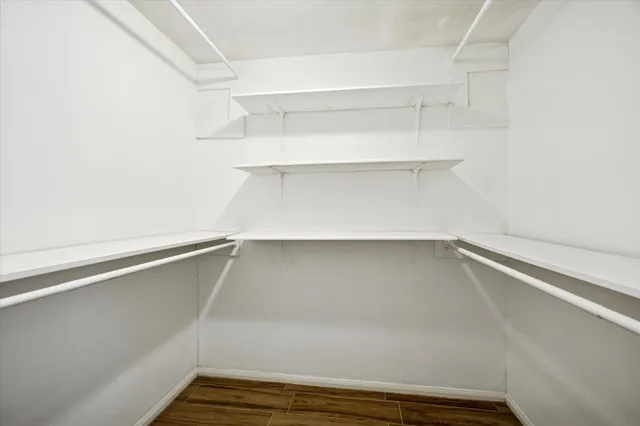 a view of an empty walk in closet