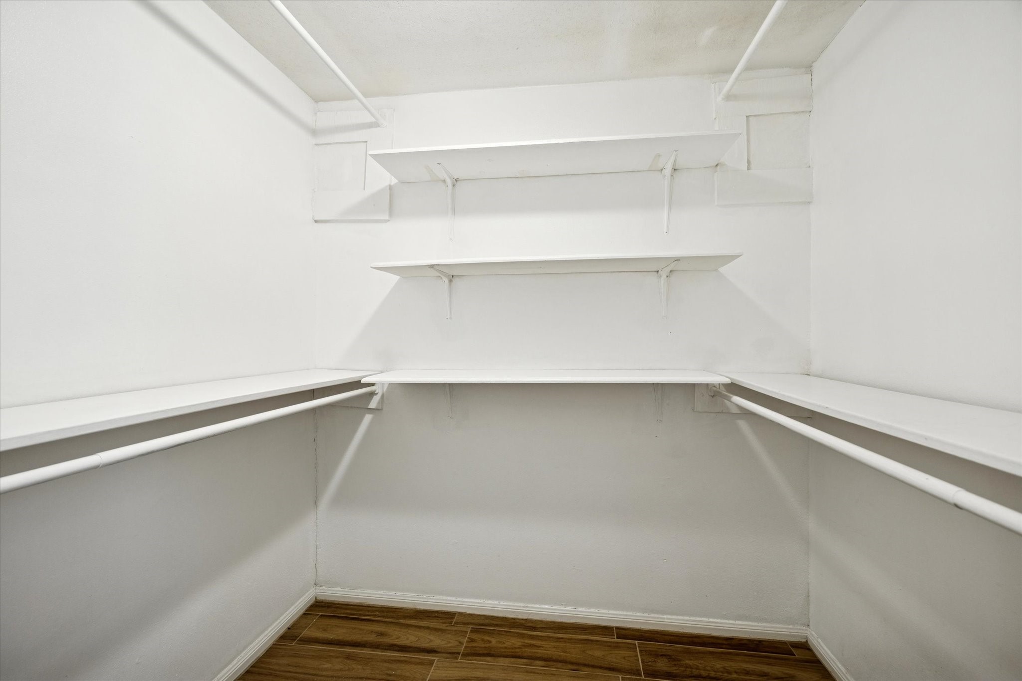 7600 Burgoyne Road, Unit 152 Houston, TX 77063 - Photo 7 of 16 a view of an empty walk in closet
