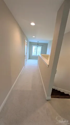 a view of a livingroom with a staircase