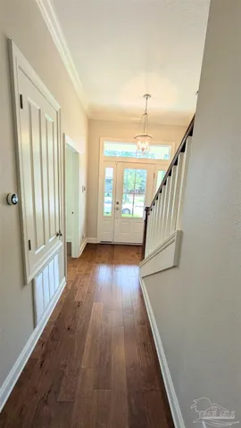 a view of entryway with wooden floor