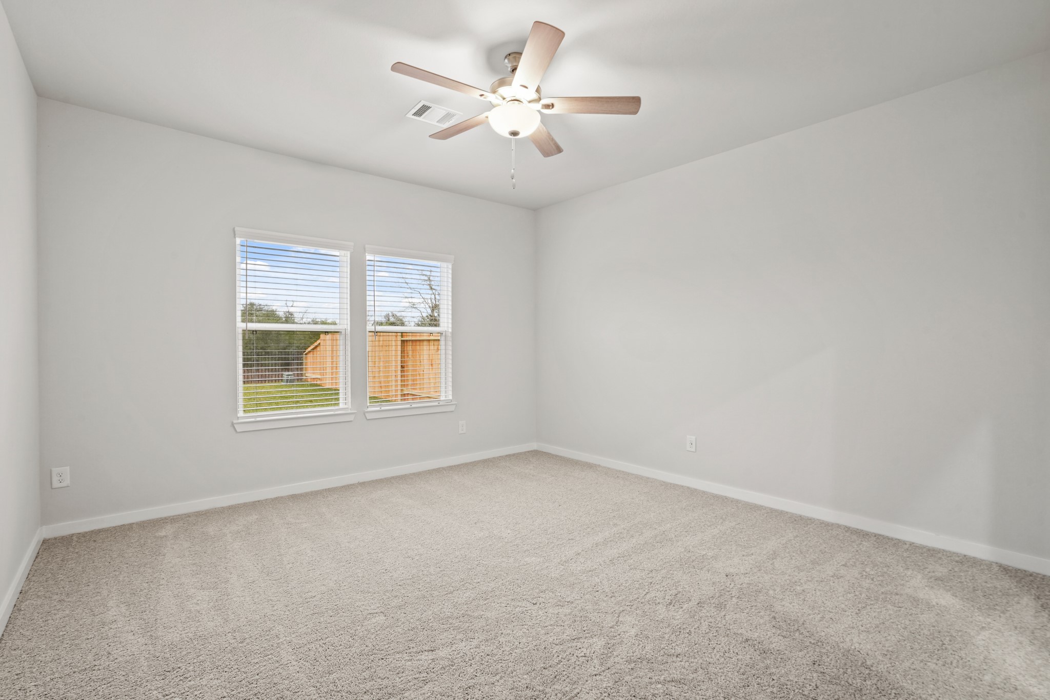 512 Shoreview Drive Conroe, TX 77303 - Photo 9 of 27 a view of an empty room with a window
