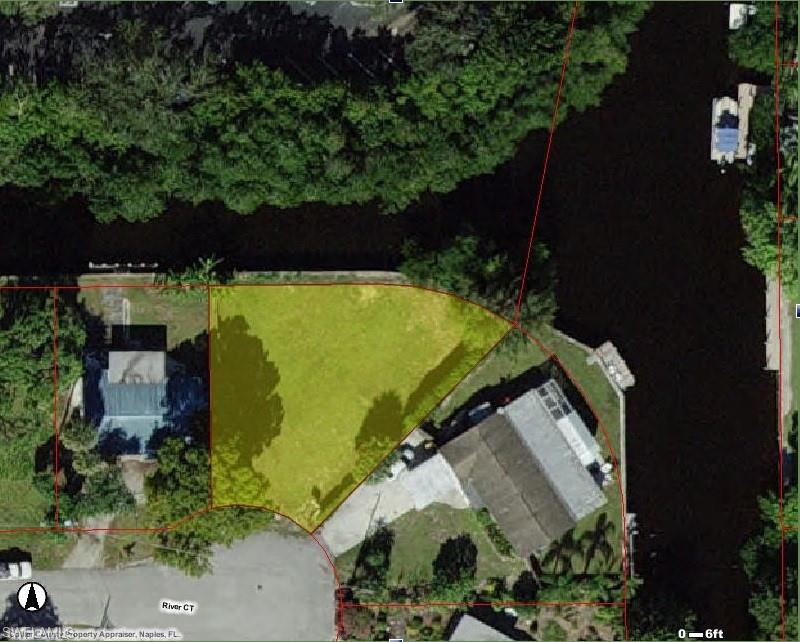 Undisclosed Address Naples, FL 34110 - Photo 3 of 15 an aerial view of a house having outdoor space