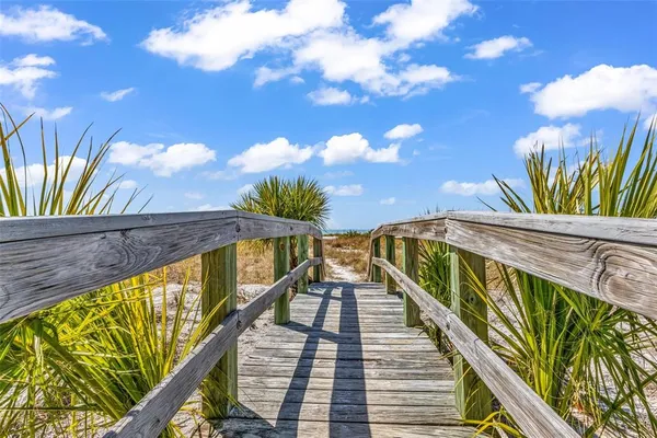 an aerial view of a house with garden space lake view and mountain view