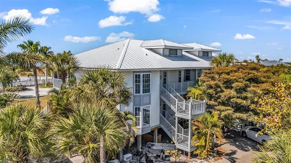 an aerial view of a golf course with swimming pool