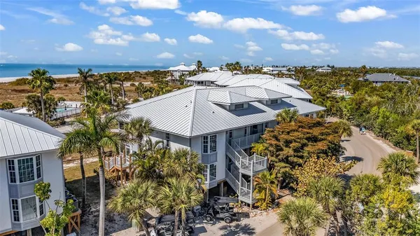 a view of outdoor space with deck and tree