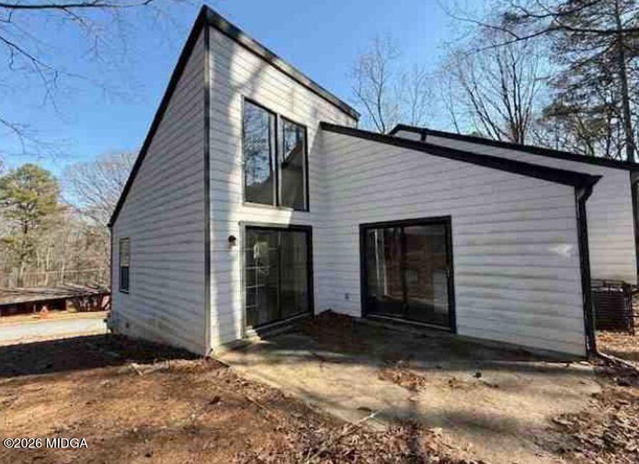 4485 Spring Valley Parkway College Park, GA 30349 - Photo 3 of 3 a view of a house with a yard