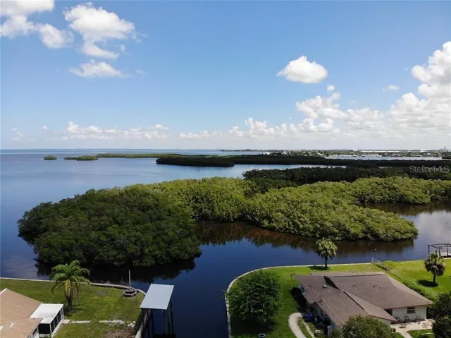 a garden view with a lake view