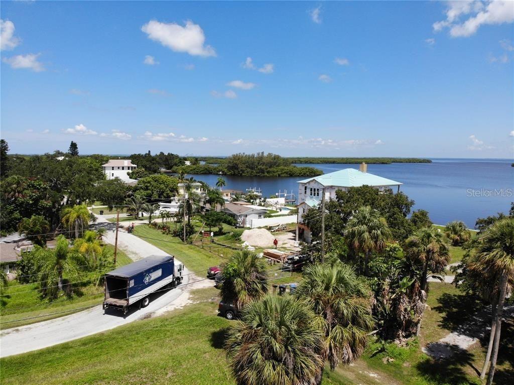 Canal Street Ruskin, FL 33570 - Photo 12 of 14 a garden view with a lake view