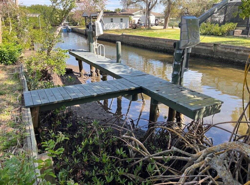 Canal Street Ruskin, FL 33570 - Photo 4 of 14 a view of a house with pool and sitting area