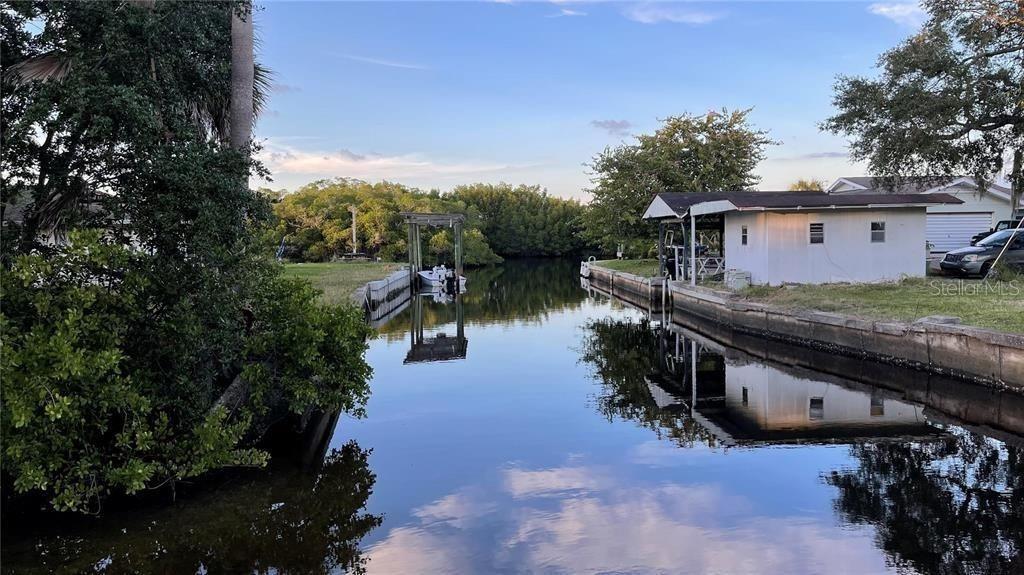 Canal Street Ruskin, FL 33570 - Photo 7 of 14 a view of a house with a yard
