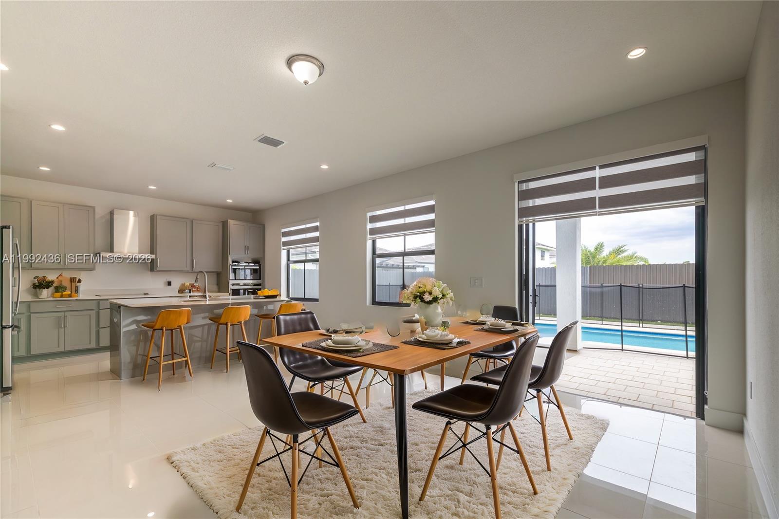1841 Southwest 145th Avenue, Unit 1841 Miami, FL 33175 - Photo 6 of 23 a view of a dining room with furniture