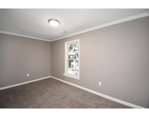 41 Florida Street Springfield, MA 01109 - Photo 13 of 23 a view of an empty room with a window